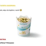 Nowe McFlurry pistacjowe McDonald's w przezroczystym kubku z zielonym sosem pistacjowym i kawałkami orzechów